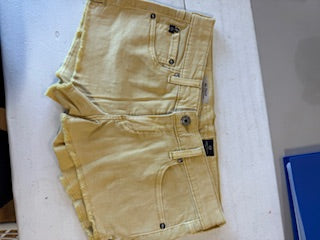 The Daisy low rise yellow jean shorts