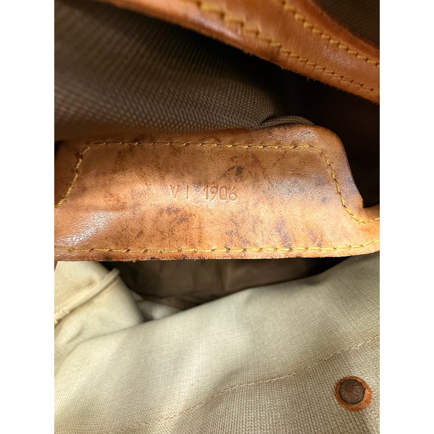Louis Vuitton Leather Monogram Canvas Evasion Travel Bag