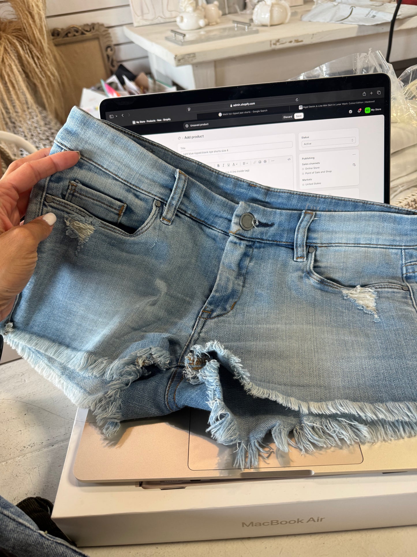 light blue ripped blank nye shorts size 4