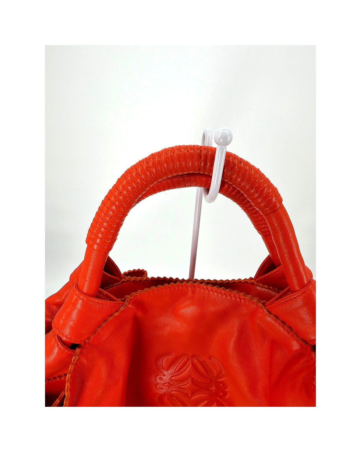 Loewe Nappa Aire Orange Leather Top Handle Bag Embossed Anagram Ruched