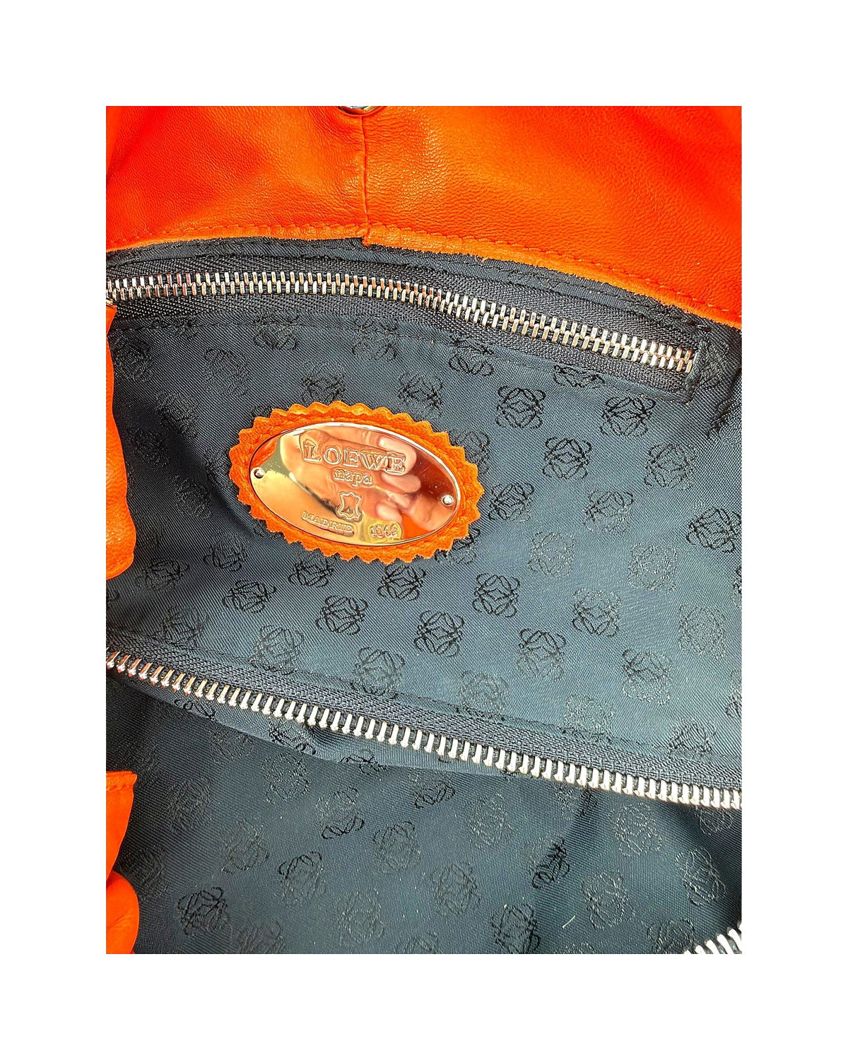 Loewe Nappa Aire Orange Leather Top Handle Bag Embossed Anagram Ruched