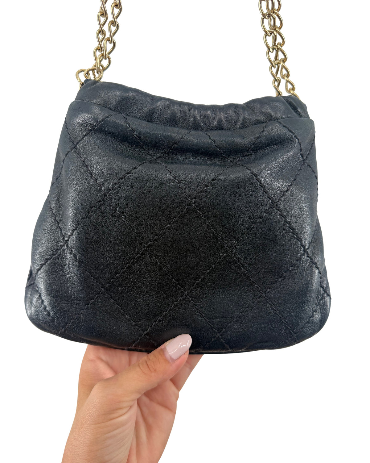 Chanel Black Quilted Lambskin Drawstring Bucket Bag Floral CC Applique Chain Strap