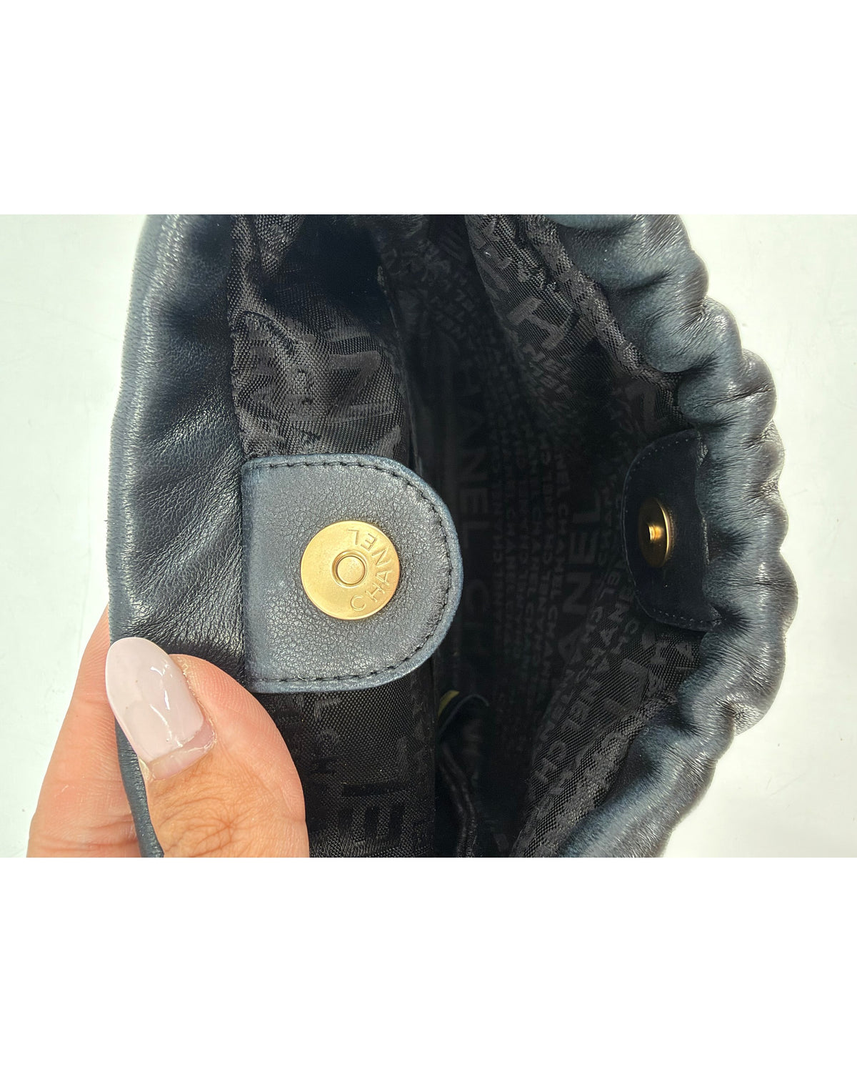 Chanel Black Quilted Lambskin Drawstring Bucket Bag Floral CC Applique Chain Strap
