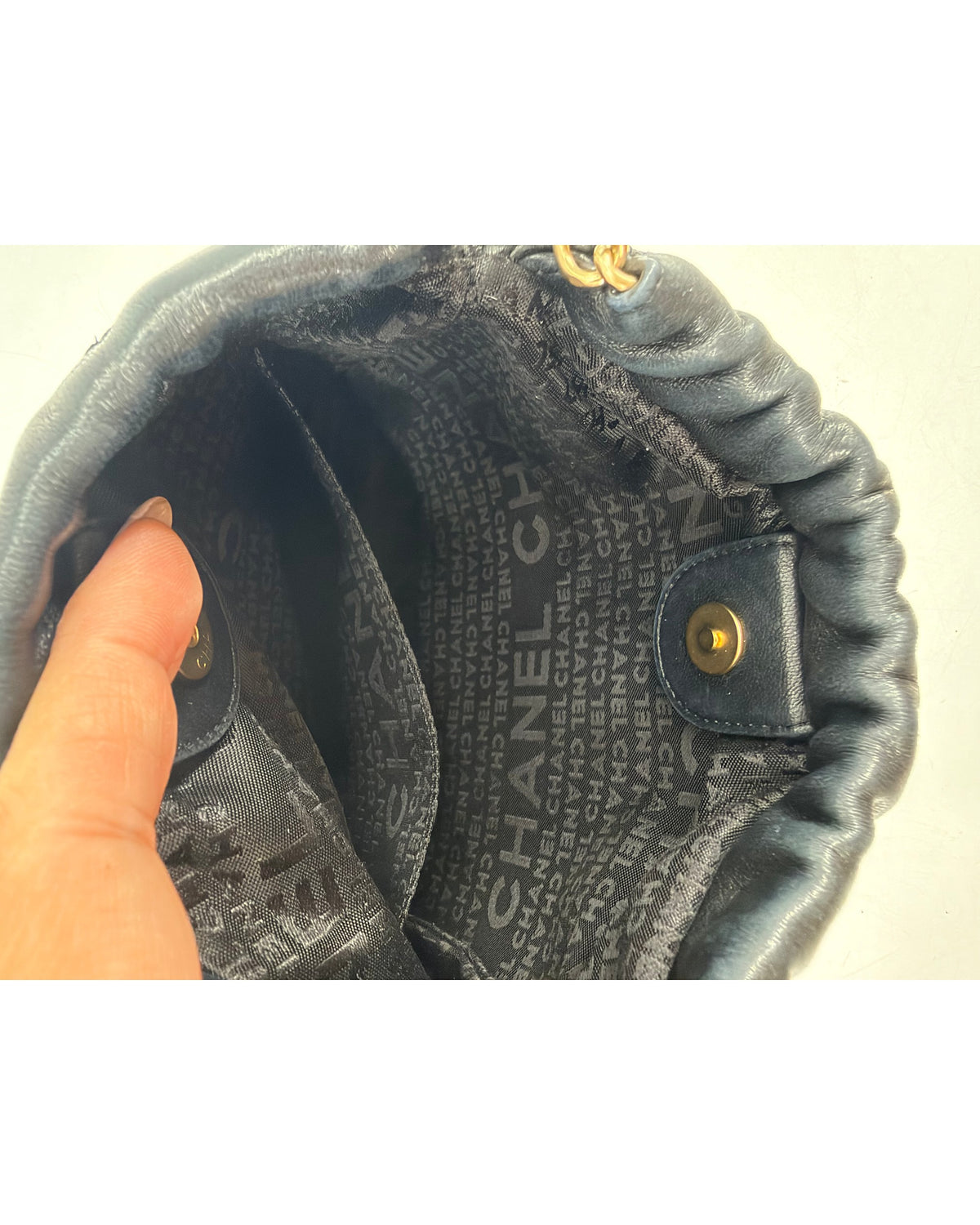 Chanel Black Quilted Lambskin Drawstring Bucket Bag Floral CC Applique Chain Strap