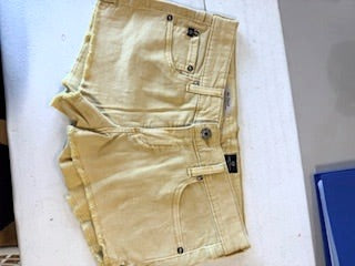 The Daisy low rise yellow jean shorts