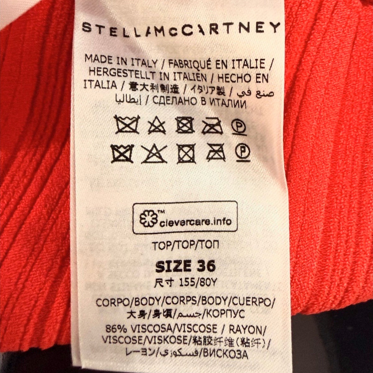 Stella McCartney Off Shoulder Cut Out Textured Knit Top